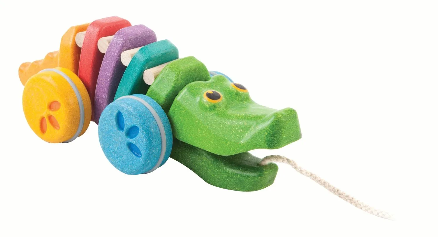 Plan Toys - Nachziehtier - Regenbogen Krokodil, Gummibaumholz
